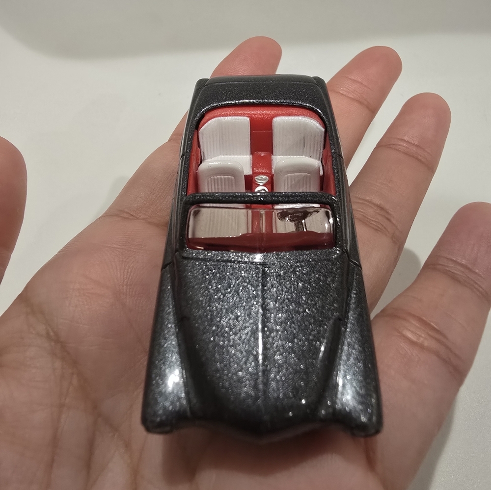 Shiny Black Toy Car with Red Interior